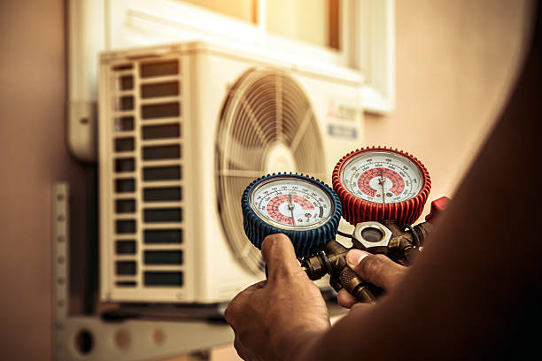 Professional Air Conditioning Service technician working in Fingerville, SC